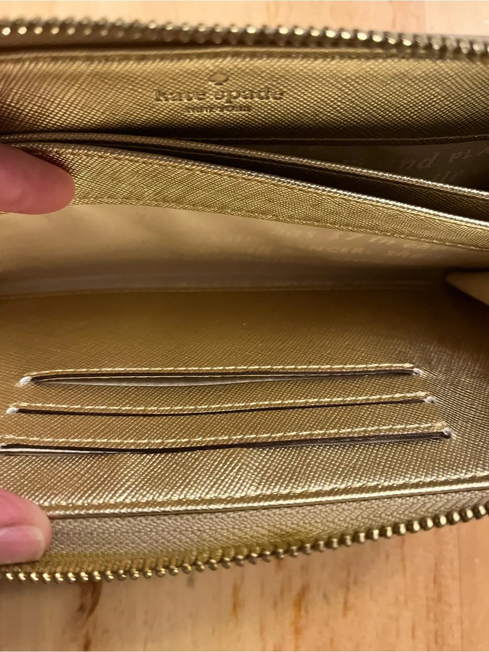 kate spade metallic gold textured zip wallet
